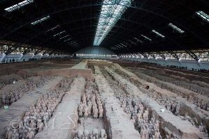 Photograph from the Terracotta army featuring a room fool of soldier sculptures