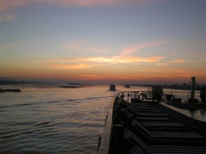 photograph of sunset looking over boat