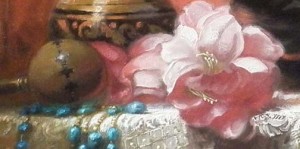 detail of painting with pink florals and turquoise stone necklace