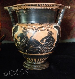 Greek vase brought to me by the client to be used in the composition. (Approx 12" high). Black on red 5th century BCE.