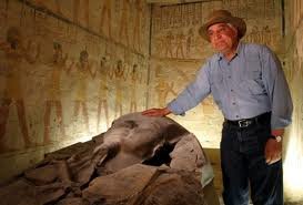 photograph of man in old Egypt temple